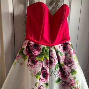 dress size 8 only worn once. kept in a none smoking environment. Asking 250